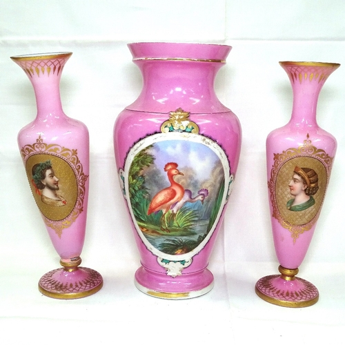 538 - A pair of Continental pink glass vases with portrait decoration, 31cm, and a similar larger vase