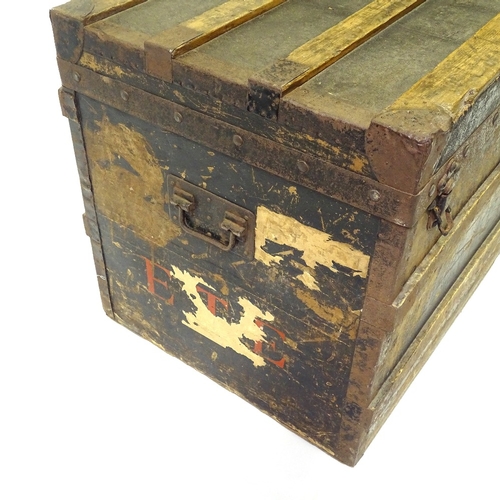 404 - Early Louis Vuitton wood and metal-bound travelling trunk, original label inside, serial no. 141019,... 