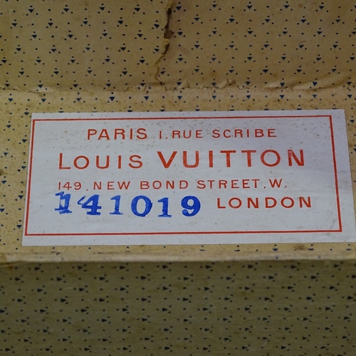 404 - Early Louis Vuitton wood and metal-bound travelling trunk, original label inside, serial no. 141019,... 