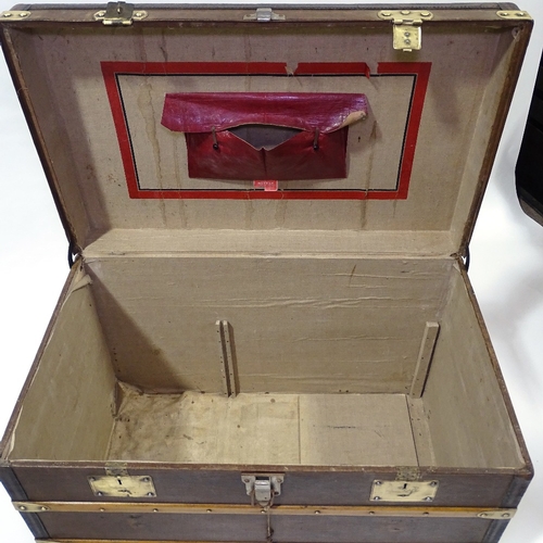 405 - An early wood leather and brass-bound travelling trunk by Moynat, original label inside lid, 90cm x ... 