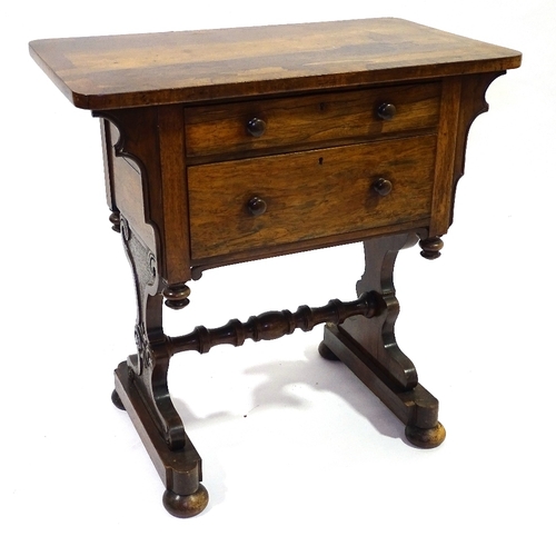 410 - A 19th century rosewood 2 drawer side table on stretcher base, width 71cm