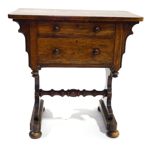 410 - A 19th century rosewood 2 drawer side table on stretcher base, width 71cm