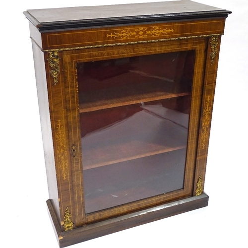 411 - A 19th century walnut pier cabinet, with inlaid marquetry and gilt-metal mounts, width 76cm