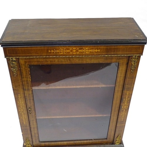 411 - A 19th century walnut pier cabinet, with inlaid marquetry and gilt-metal mounts, width 76cm