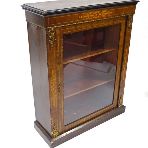 411 - A 19th century walnut pier cabinet, with inlaid marquetry and gilt-metal mounts, width 76cm