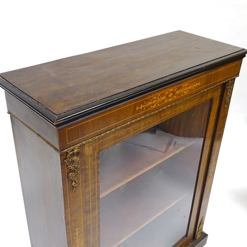 411 - A 19th century walnut pier cabinet, with inlaid marquetry and gilt-metal mounts, width 76cm