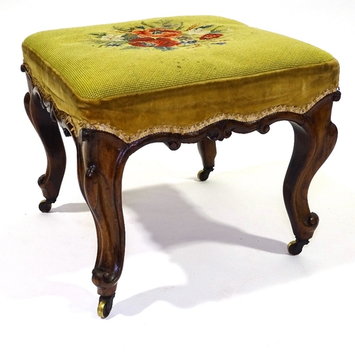 412 - A Victorian square rosewood upholstered dressing stool, with carved frieze and brass casters