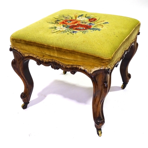 412 - A Victorian square rosewood upholstered dressing stool, with carved frieze and brass casters