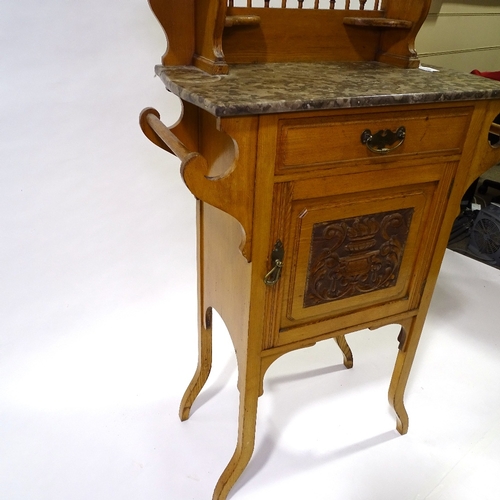 413 - An Arts and Crafts light oak marble-topped wash stand, with mirror inset upper part