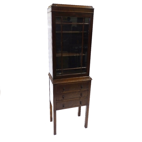 414 - A narrow Edwardian mahogany display cabinet with drawers under, width 45cm