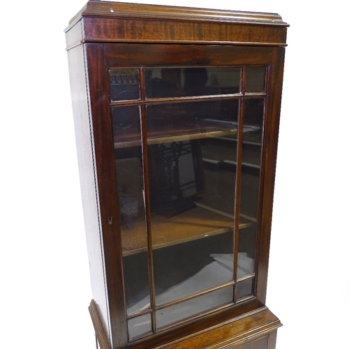 414 - A narrow Edwardian mahogany display cabinet with drawers under, width 45cm