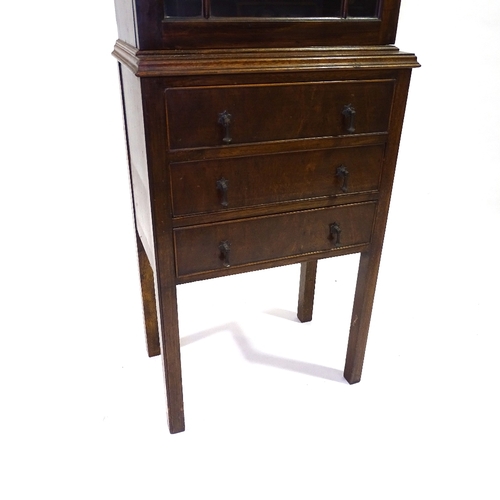 414 - A narrow Edwardian mahogany display cabinet with drawers under, width 45cm