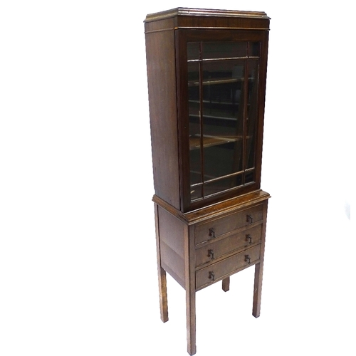 414 - A narrow Edwardian mahogany display cabinet with drawers under, width 45cm