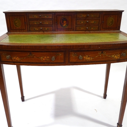 423 - An Edwardian satinwood and rosewood crossbanded writing desk, with painted decoration, width 94cm