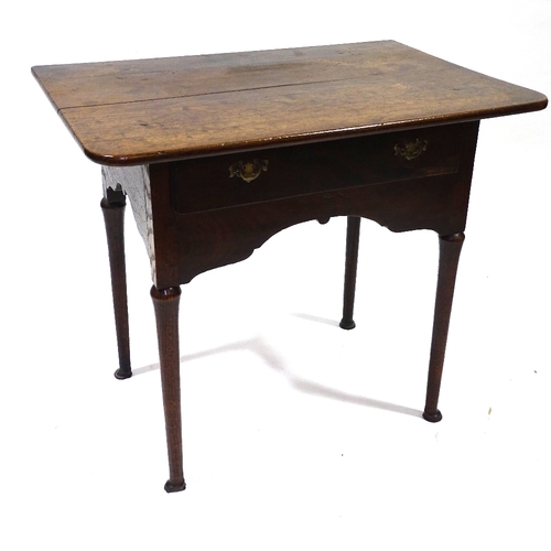 432 - An 18th century oak lowboy, with frieze drawer, turned legs and pad feet, width 79cm