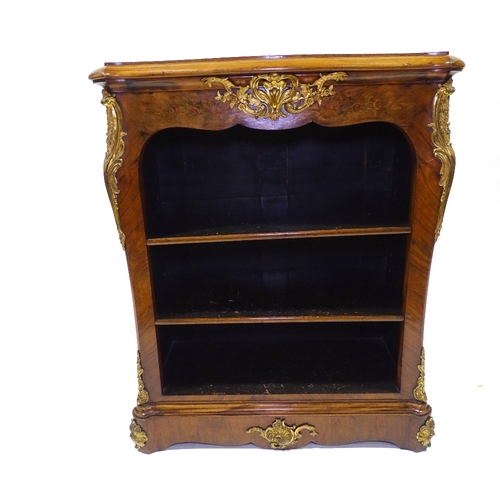 440 - A 19th century walnut open bookcase of small size, with shaped top, floral marquetry inlaid frieze a... 