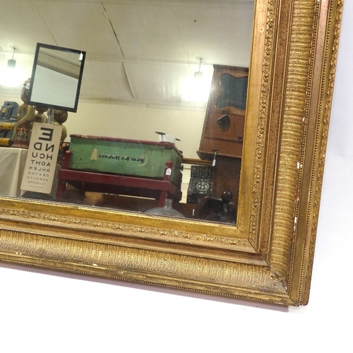 443 - A Victorian gilt-gesso framed wall mirror, overall dimensions 105cm x 94cm