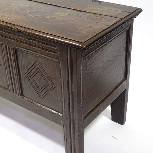 446 - A 17th/18th century panelled oak coffer of small size, length 110cm