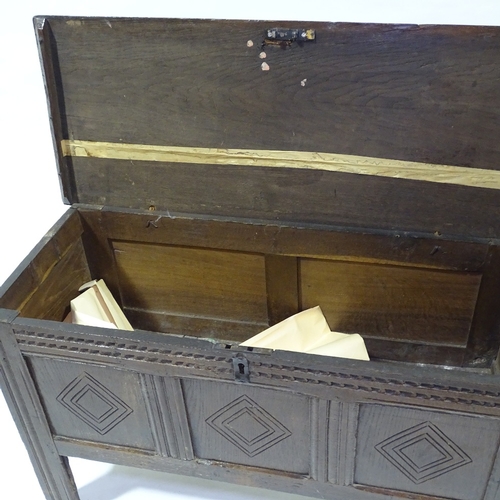 446 - A 17th/18th century panelled oak coffer of small size, length 110cm