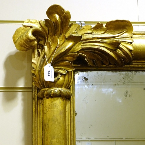 134 - A 19th century carved giltwood framed overmantle mirror with acanthus pediment, width excluding leaf... 