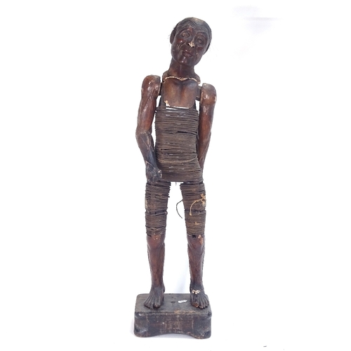 1 - A 19th century carved and lacquered wood figure of an elderly man, bentwood-bound body with detachab... 