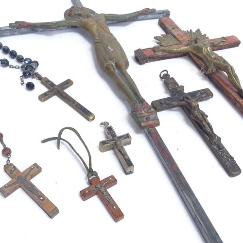 41 - Various painted wood and metal crucifix, largest height 32cm