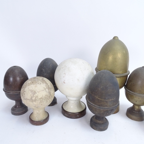 45 - Various cast-metal and ceramic finials, largest height 24cm