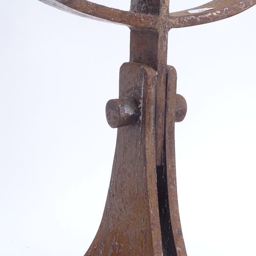 46 - A large cast-iron candle holder, height 84cm