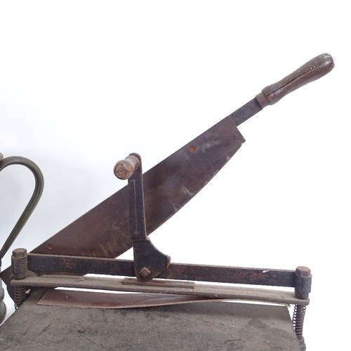 52 - A painted and gilded bargeware tin water can, and a cast-iron paper guillotine, can height 34cm (2)