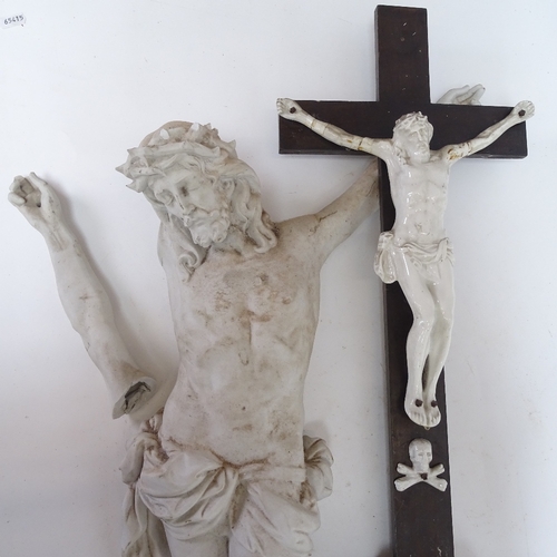 64 - 2 ceramic crucifix, largest height 57cm (1 A/F) (2)