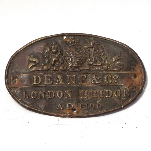 103 - Various enamel ceramic and brass signs, including Deane & Co of London Bridge