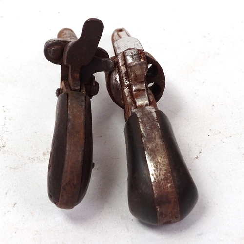 107 - 2 19th century small pinfire pocket pistols with wood grips, largest length 11cm (2)