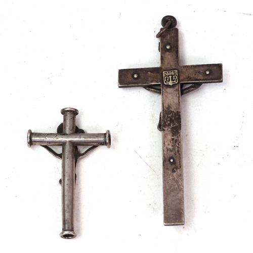 112 - 2 unmarked white metal crucifix, largest height 14.5cm (2)