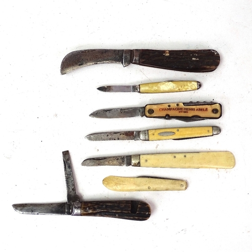 117 - Various pocket knives and Swiss Army knives, including examples with stag horn grips