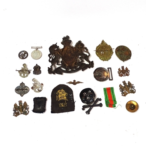 119 - Various Army and military cap and helmet badges, including unmarked white metal skull and crossbones... 