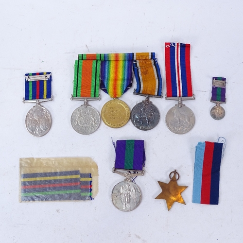 156 - A group of medals to Pte W J Sydenham no. 16317 Middlesex Regiment, including George VI General Serv... 