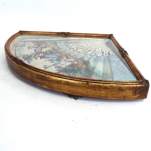 92 - A 19th century Italian ivory fan, over-painted printed scenes, in glazed display case, case length 4... 