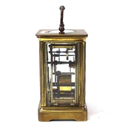 97 - A brass-cased carriage clock, case height 11cm, not currently working, with key