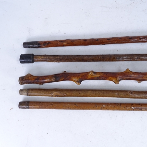 186 - 5 carved wood walking sticks and canes