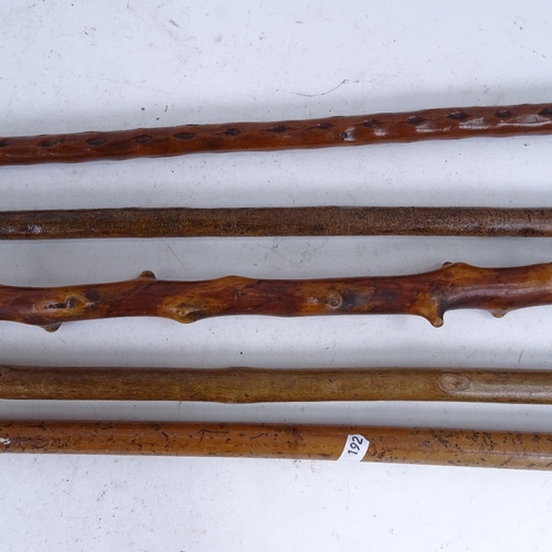 186 - 5 carved wood walking sticks and canes