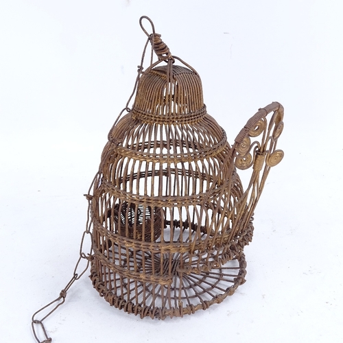 208 - A small gilded wirework beehive-shape hanging bird cage, and a bent hardwood dome-top hanging bird c... 