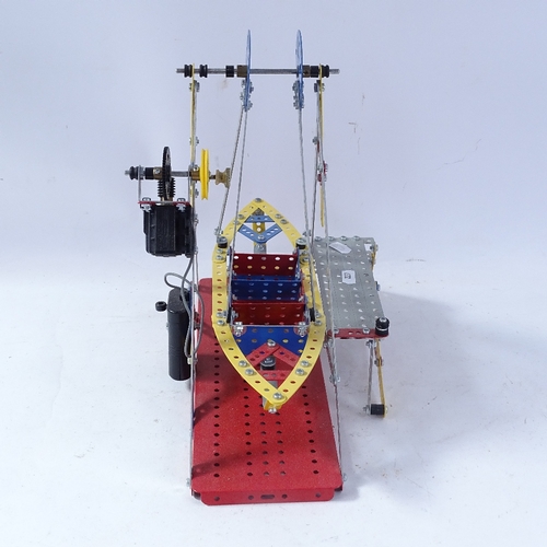 227 - A modern Meccano fairground swinging ship, ship length 35cm