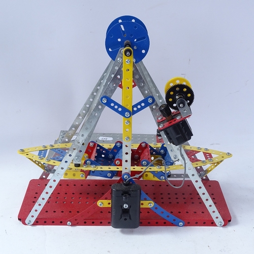 227 - A modern Meccano fairground swinging ship, ship length 35cm