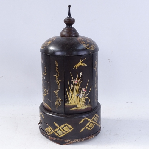 240 - An Oriental ebonised and gilded wood mechanical cigar stand/dispenser, with twisting knop, height 34... 