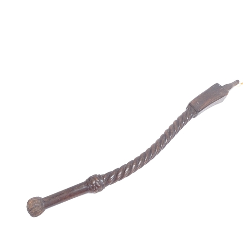 67 - An Antique oak boat tiller, carved twisted stem with floral handle terminal, length 80cm