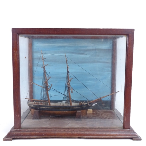 77 - A scratch-built hand painted 2-masted model ship, in glazed and painted display case, case height 36... 