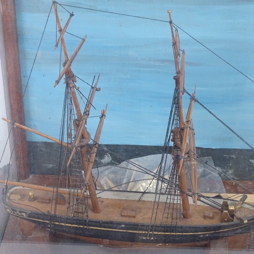 77 - A scratch-built hand painted 2-masted model ship, in glazed and painted display case, case height 36... 