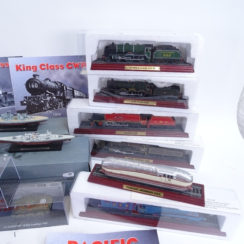 85 - A collection of Atlas Editions Wartime boats, tanks, vehicles and trains, mostly boxed