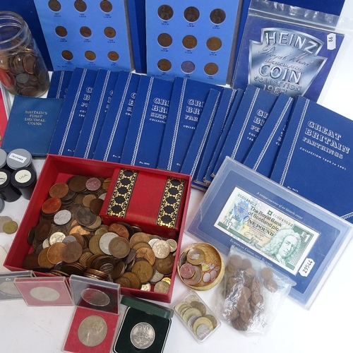 86 - A collection of various world coins and banknotes