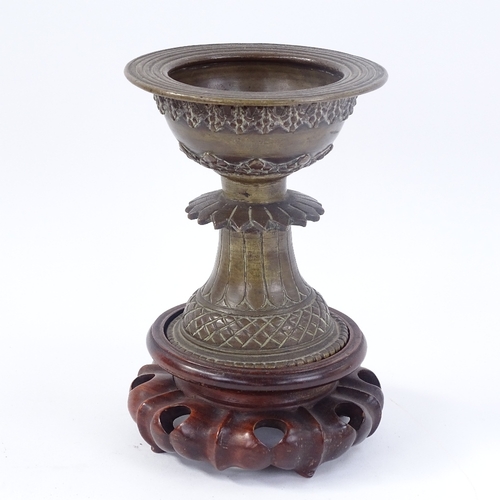 250 - An Oriental bronze pedestal incense burner, on turned wood stand, overall height 18cm